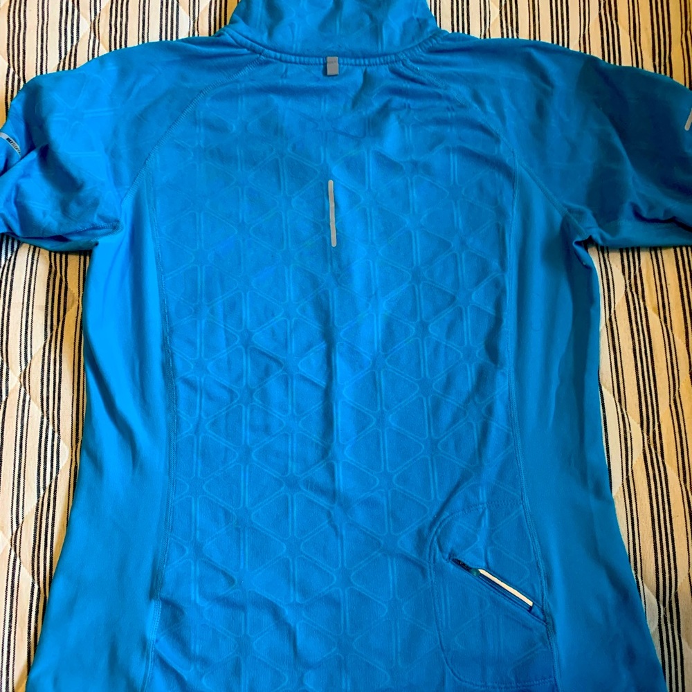 Nike 1/4 zip.  Some pilling, otherwise good condition.